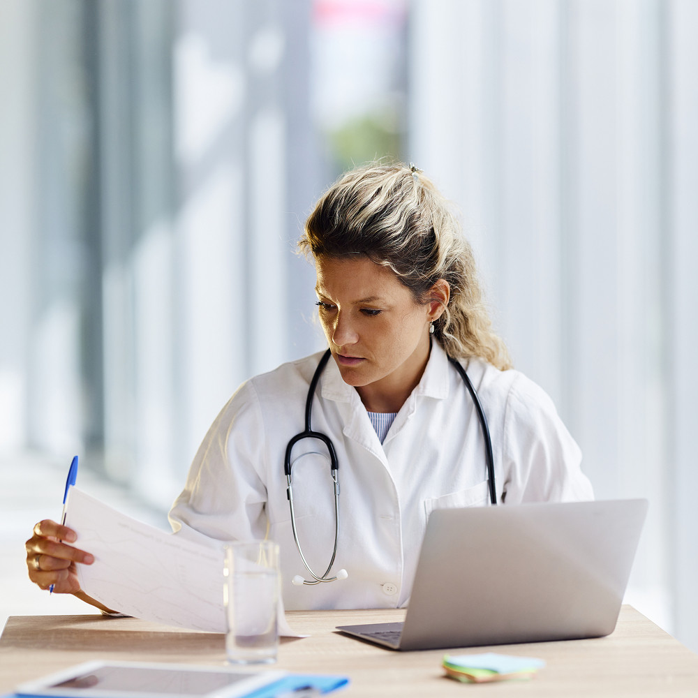 medical professional provided care for patient in their hospital bed